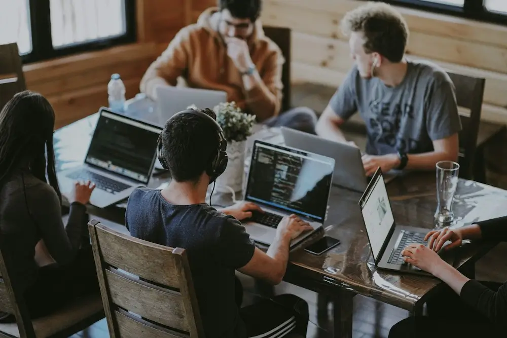 Software development services UK — cross-functional development team collaborating on a custom software project