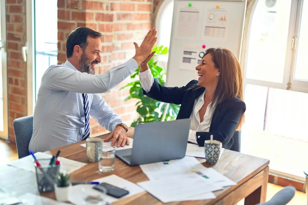 Vrinsoft UK software development partner — professional delivery team collaborating with clients on enterprise digital transformation